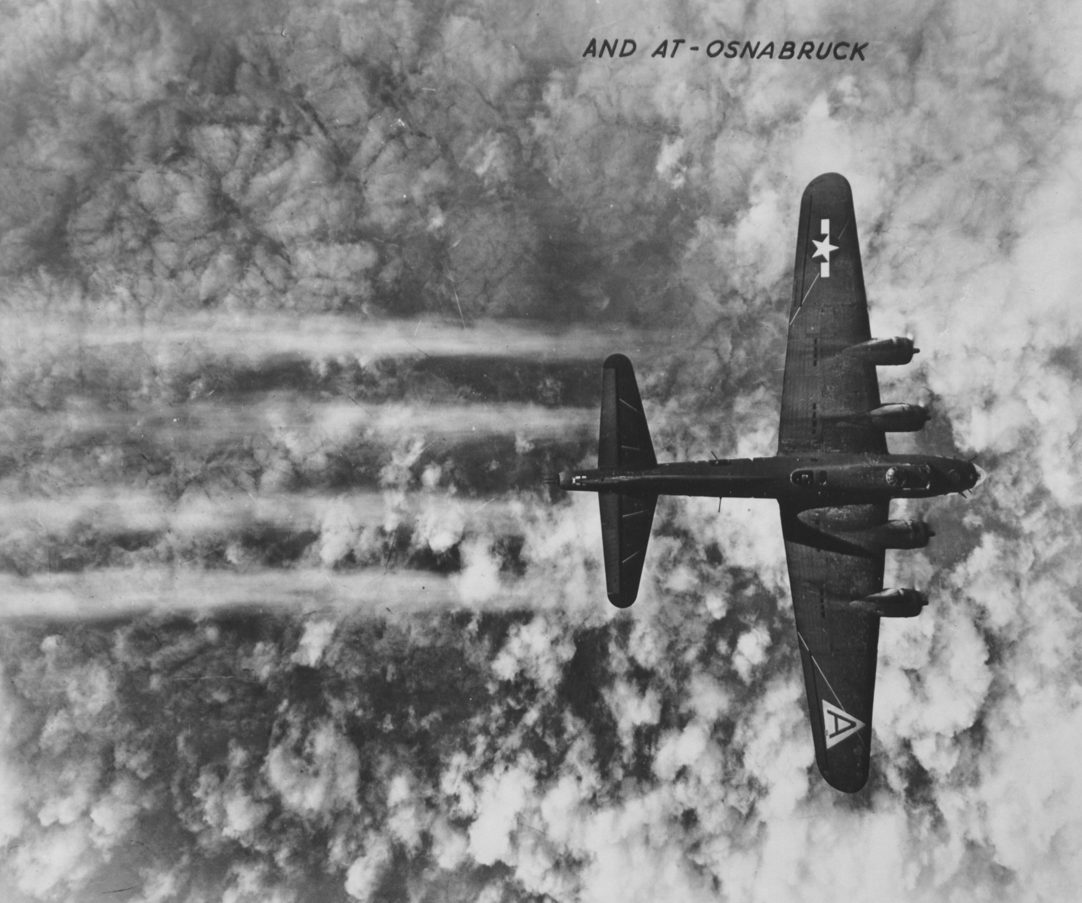 Boeing B-17 Flying Fortress over Osnabruck, Germany. Blind bombing is necessary due to the thick clouds over the target. The bomber is of the 91st Bomb Group.
