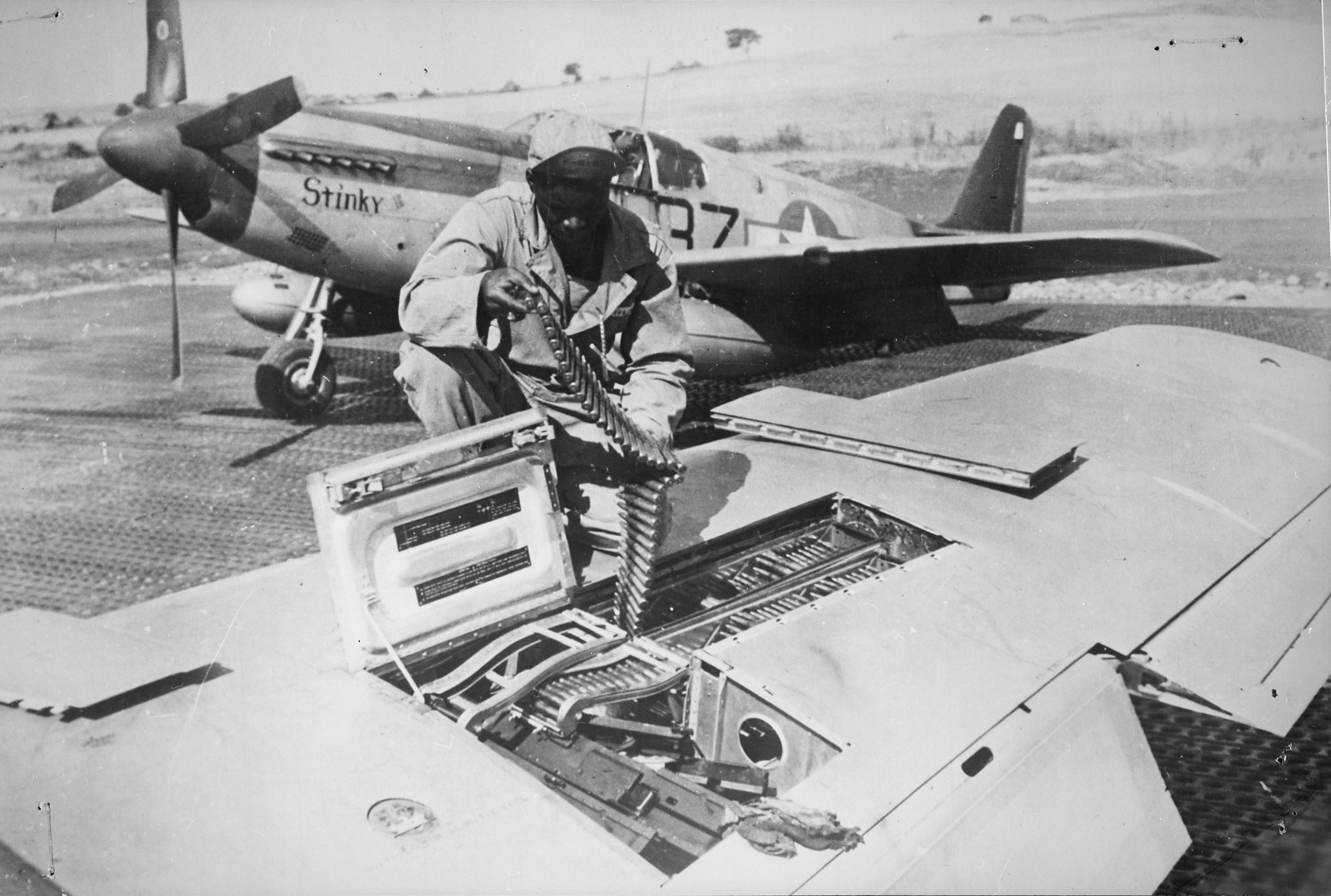 An image of John T. Fields, an armorer with the 332nd Fighter Group.