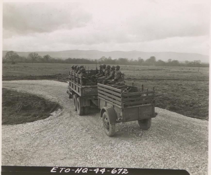 Historical image showing Personnel Truck and Trailer of the 3889 Gas Supply Company of Black American soldiers during WWII